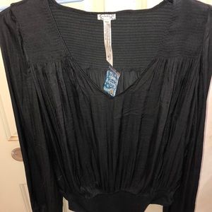 Black body suit with V neck blouse